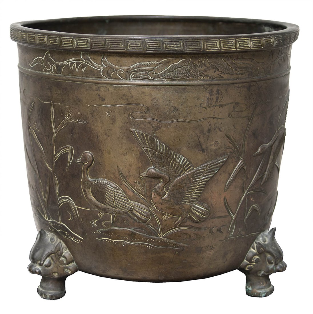 19TH C. CHINESE BRONZE URN Carved in high and low relief showing ducks at the river's edge, (1 of 4)