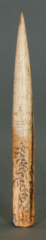 Two whalebone fids: TWO 19TH C. WHALEBONE FIDS Fids or prickers used for ships rope work, one with scrimshaw depicting a whale with spout, crossed swords, trailing vines and an anchor on top, old yellow patina, 10 1/2" l