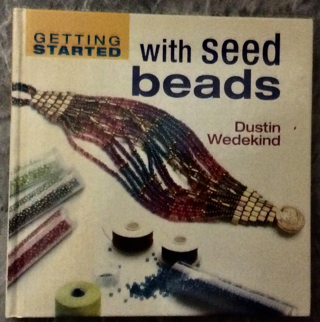 Hardcover 2007 Seed Beads Craft Reference Book: Hardcover 2007 Craft Seed Beads Reference Book. "Getting Started With Seed Beads" by Dustin Wedekind. HARDCOVER 2007 Interweave Press "Getting Started" Series 1st Edition, 3rd Printing w/ numbers 3-10