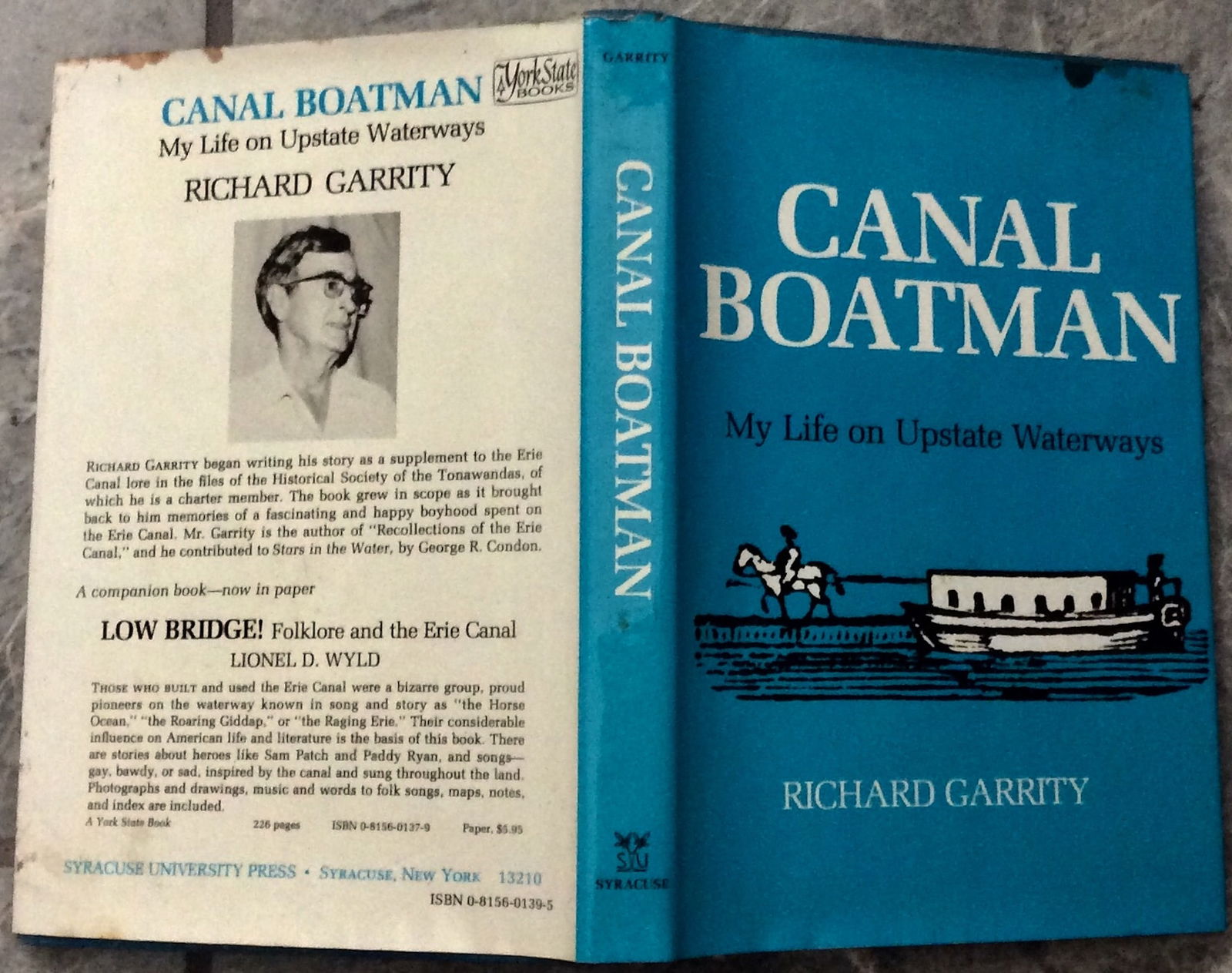 "Canal Boatman" by Richard Garrity 1977 Hardcover History Of Erie Canal Boatman Stated 1st Edition: 1977 Hardcover History Of Erie Canal Boatman Stated 1st Edition 1st Printing In Dust Jacket. "Canal Boatman: My Life on Upstate Waterways" by Richard Garrity. HARDCOVER 1977 Syracuse University Press