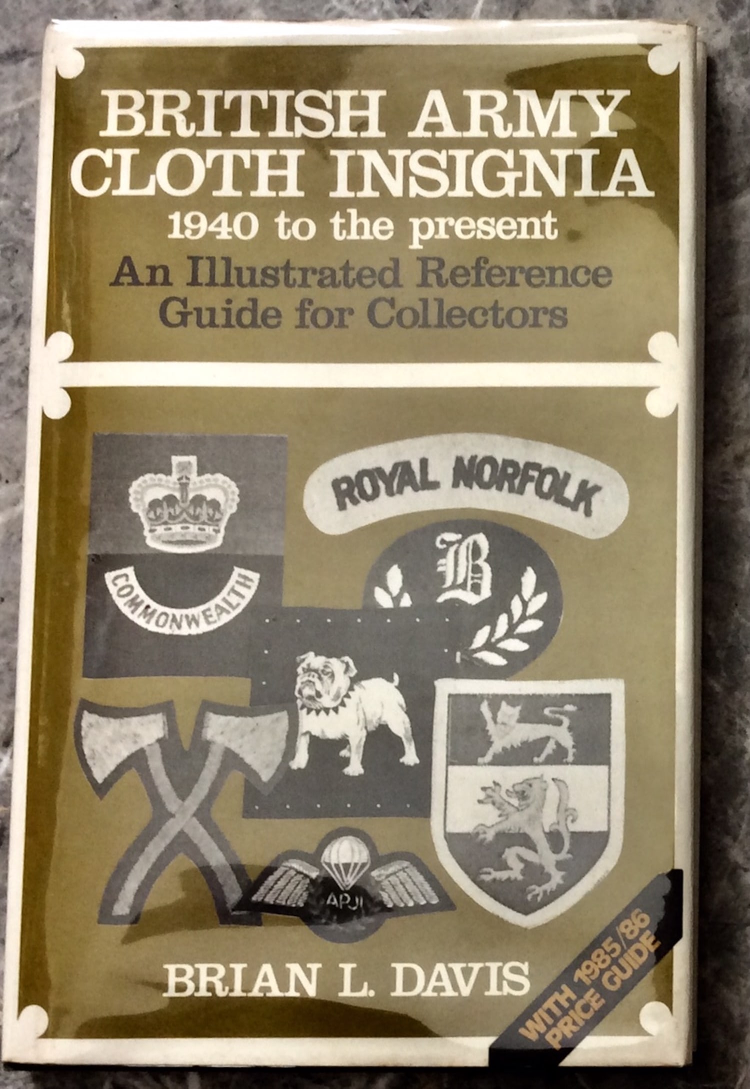 "British Army Cloth Insignia" by Brian Davis Hardcover 1985 British Army Insignia 1st Edition 1st: Hardcover 1985 British Army Insignia 1st Edition 1st Printing In Dust Jacket. "British Army Cloth Insignia: 1940 To The Present. An illustrated Reference Guide for Collectors." by Brian Davis. HARDCOV