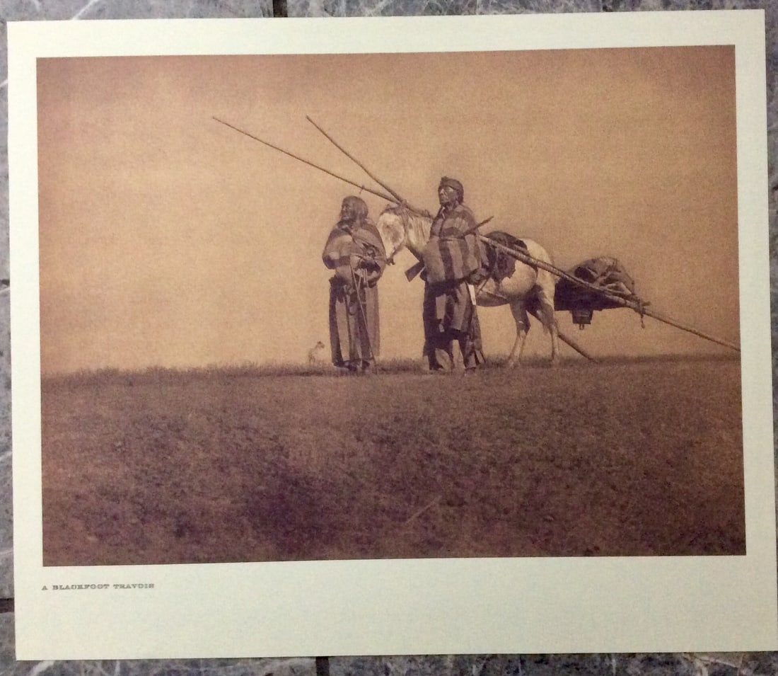 "A BLACKFOOT TRAVOIS" Edward Curtis 2006 Sepia Tone American Indian Photo: Sepia Tone North American Indian Photo Of Western Indian Life By Famed 19th Century American Photographer Edward S. Curtis. Copyright 2006 by Tess Press/BBS Publishing. Suitable for framing, each phot