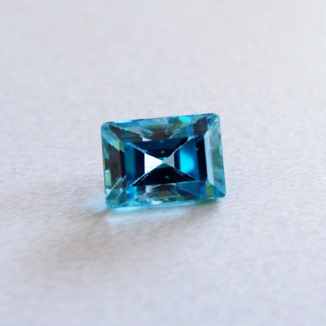 Natural Blue Zircon Baguette Cut 3.11Ct 7.9x5.7x5.3 mm: Gem: Natural Blue Zircon Measurement: 7.9x5.7x5.3 mm Weight: 3.11 Carat Shape: Baguette Facet Clarity: VVS, Color: Blue Treatment: Heated Origin: Cambodia Estimate Value Prices $1,220 Item will