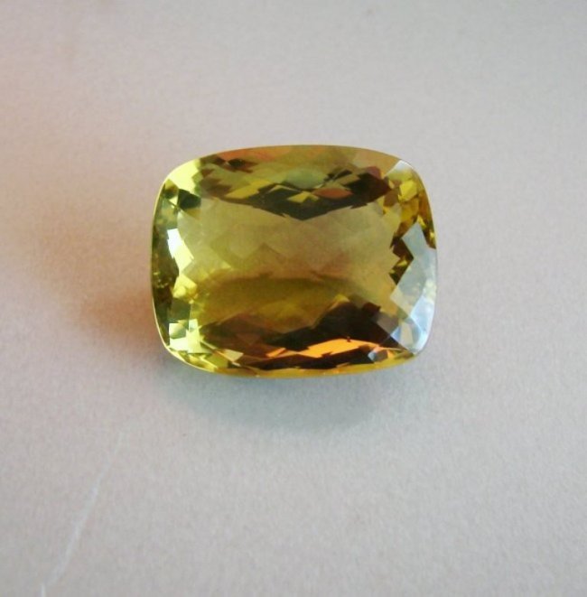 Natural Lemon Topaz Octagon Shape 48.06Ct 25x20x14mm: Gem Type: Natural Lemon Topaz Weight: 48.06 Carat Measurement: 25x20x14mm Shape: Octagon Checkerboard Clarity: VS-Color: Yellow Origin: Brazil Estimate Value Price $3,870
