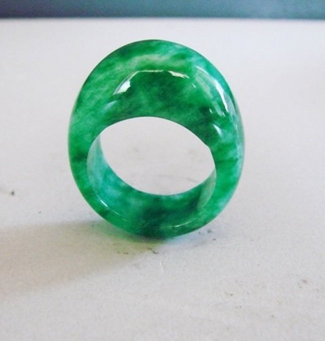 Natural Burma Jadeit Jade Dome Ring Grade â€œAâ€ Size:: Gem: Natural Jadeite Jade Ring Qty: 1, Dome Shaped Grade: A, Color: Dark Green (Has some vein Texture) Transparency: Semi -Transparent Shape & Cut: Solid Jade Band Haft Round, Jade Finish: High Polish