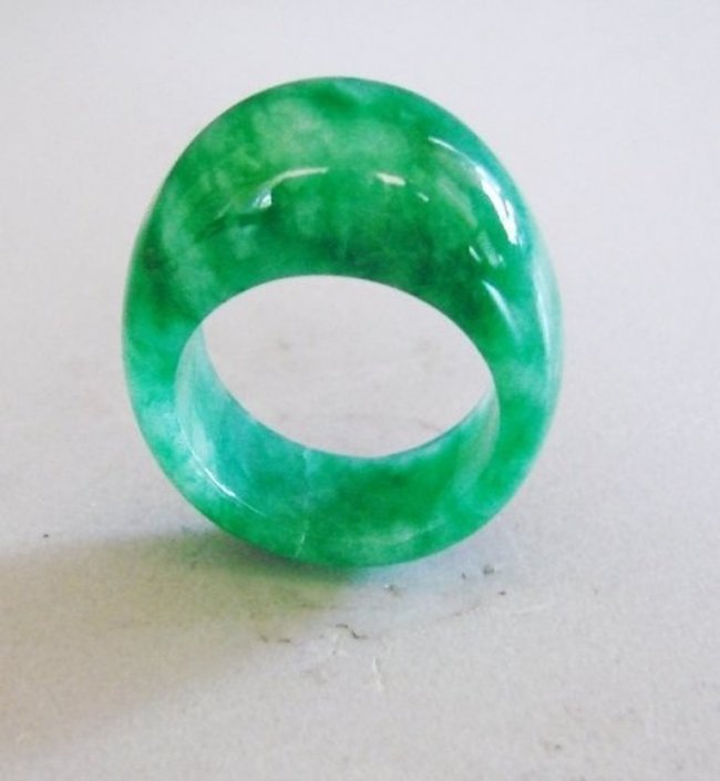 Natural Burma Jadeit Jade Dome Ring Grade â€œAâ€ Size:: Gem: Natural Jadeite Jade Ring Qty: 1, Dome Shaped Grade: A, Color: Dark Green (Has some vein Texture) Transparency: Semi -Transparent Shape & Cut: Solid Jade Band Haft Round, Jade Finish: High Polish