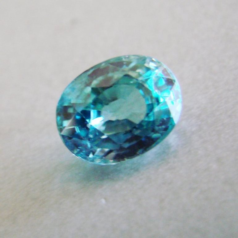 Natural Blue Zircon Oval Cut 4.85Ct 10x7.7x5.8 mm: Gem: Natural Blue Zircon Measurement: 10 x 7.7 x 5.8 mm Weight: 4.85 Carat Shape: Oval Facet Clarity: VVS, Color: Blue Treatment: Heated Origin: Cambodia Estimate Value Prices $1,750 Item will c