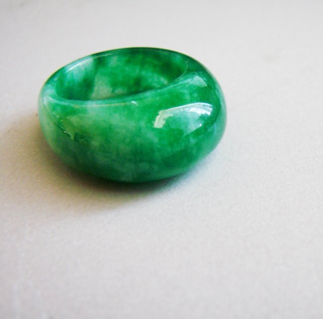 Natural Burma Jadeit Jade Dome Ring Grade A /Size 9.5: Gem: Natural Jadeite Jade Ring Dome Shaped Grade: A Color: Dark Green (Has some vein Texture) Transparency: Semi -Transparent Shape & Cut: Solid Jade Band Haft Round Jade Finish: High Polish Remarks: 