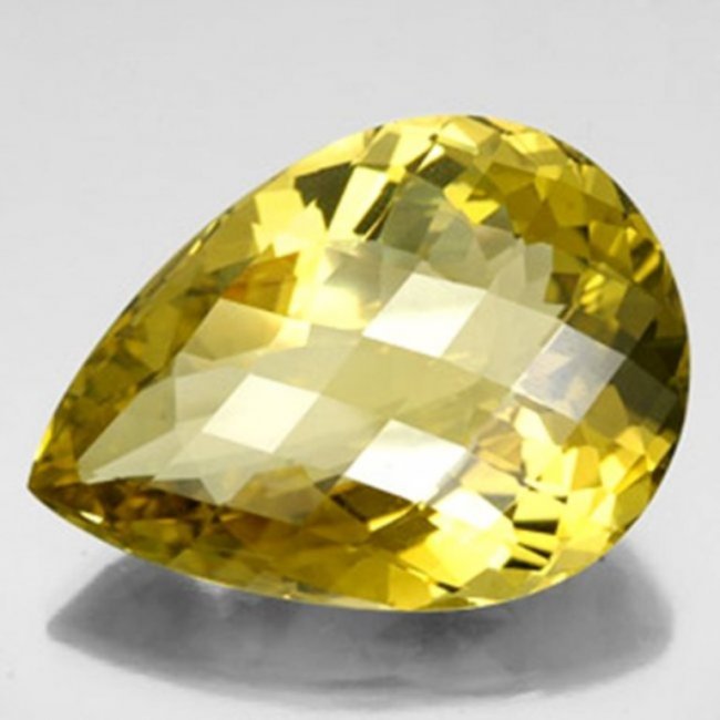 Loose Natural Lemon Topaz Pear Shape 16.54Ct: Gem Type: Natural Lemon Topaz Weight: 16.54 Carat Measurement: 23x15x9mm Shape: Pear Checkerboard Clarity: VS-Color: Yellow Origin: Brazil Estimate Value Price $870