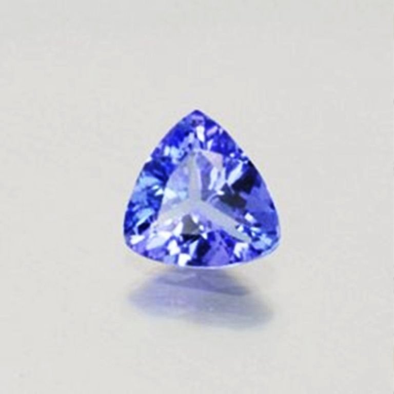 Loose Tanzanite Trillion Shape .97Ct 6x6x4.9 mm: Gem Type: Natural Tanzanite Qty: 1 Weight: .97 Carat Measurement: 6x6x4.9 mm Shape: Trillion Cut: Facet cut Clarity: VVS Color: Light Violet/Blue Treatment: None Origin: Tanzania H