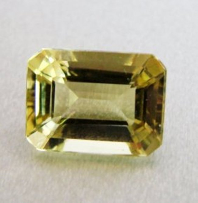 Natural Lemon Topaz Octagon Shape 3.93Ct 11x8.9x5.5mm: Gem Type: Natural Lemon Topaz Weight: 3.93 Carat Measurement: 11x8.9x5.5 mm Shape: Octagon Cut: Facet Cut Clarity: VS Color: Light Yellow Origin: Brazil