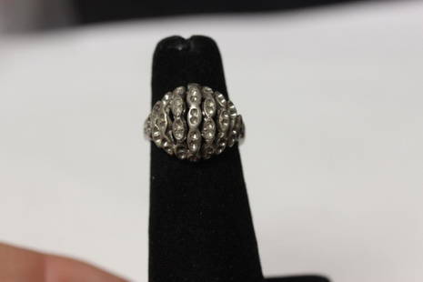 A Sterling Ring: marked 925 - size 5 - stoneless design?