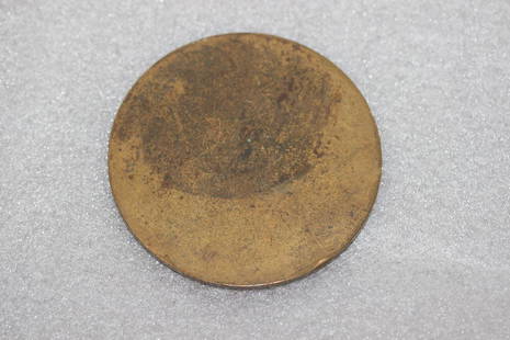 A Bronze Medal: 3 1/2" in diameter