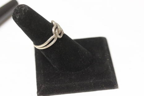 A Sterling Ring: Marked "Sterling" - size 8