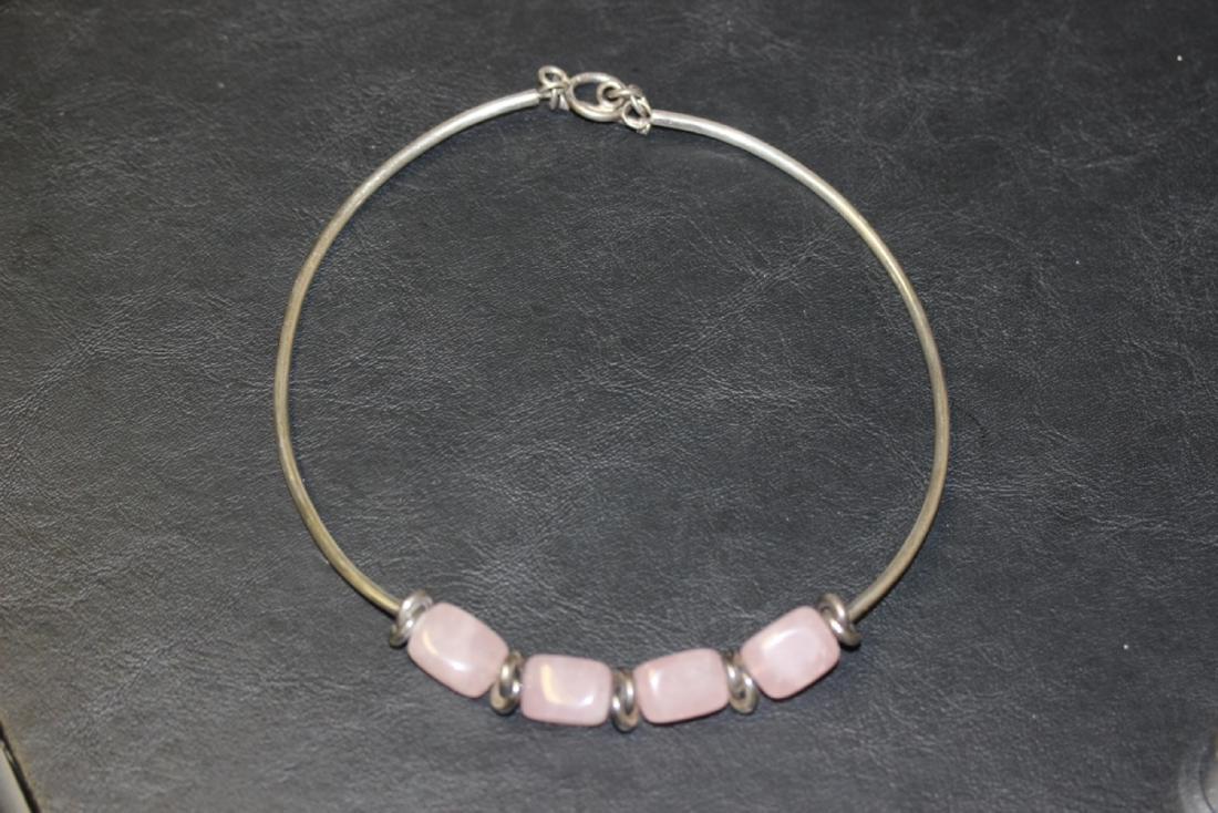 A Sterling Choker Necklace: Marked 925 on the clasp - with pink quartz stone