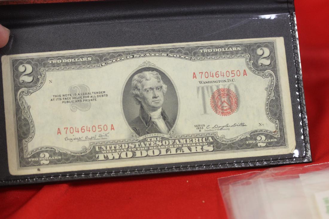 A Red Seal Two Dollar Bill: Folder from World Reserve Monetary Exchange