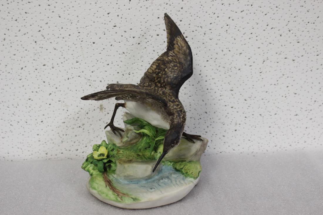 A Cybis Bird: signed - 9 3/4" tall