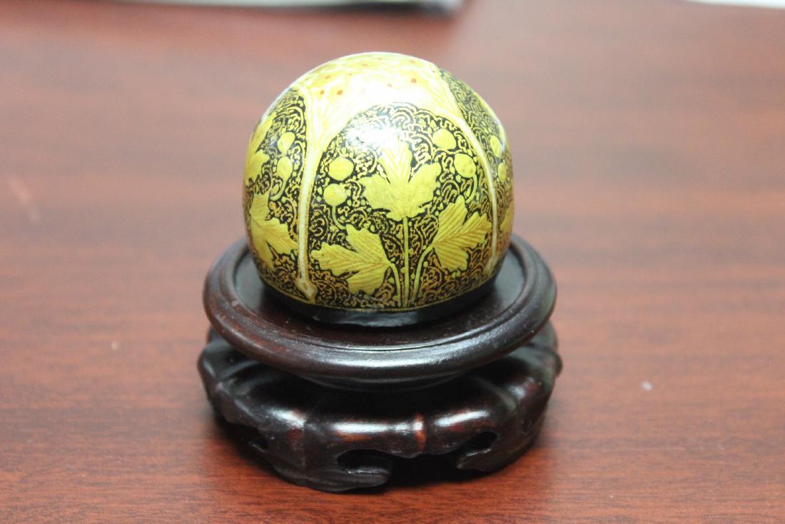 A Vintage Lacquer Ornament on Stand: overall=3 inches tall - ornament appears to be solid