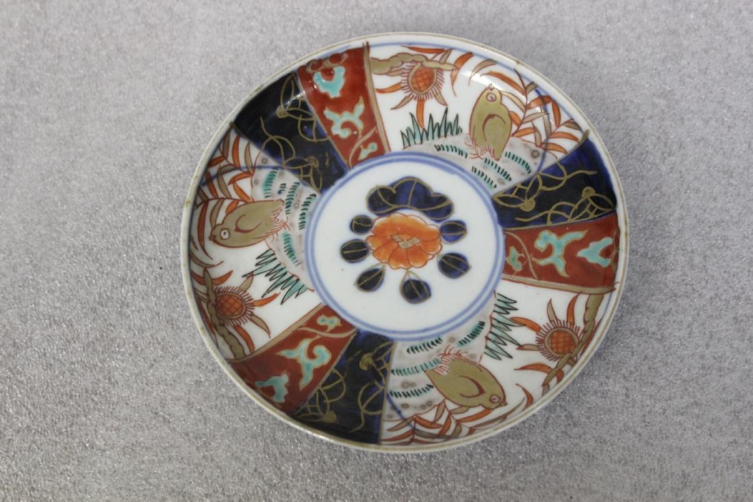 An Antique Imari Plate: 19th century - 4 3/4" in diameter - Japanese