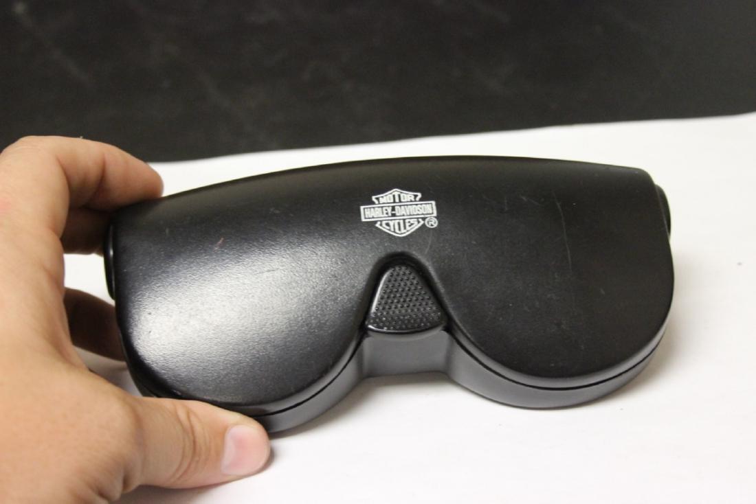 A Harley Davidson Sunglass and Case: press button open