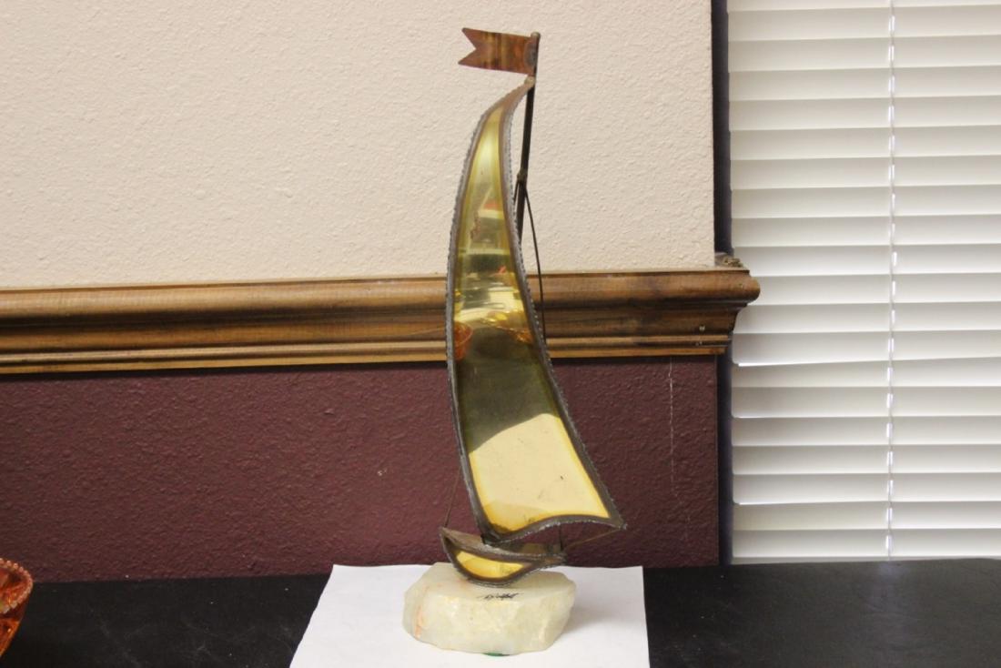 A Marked Demott Metal Ship Ornament: 15" tall