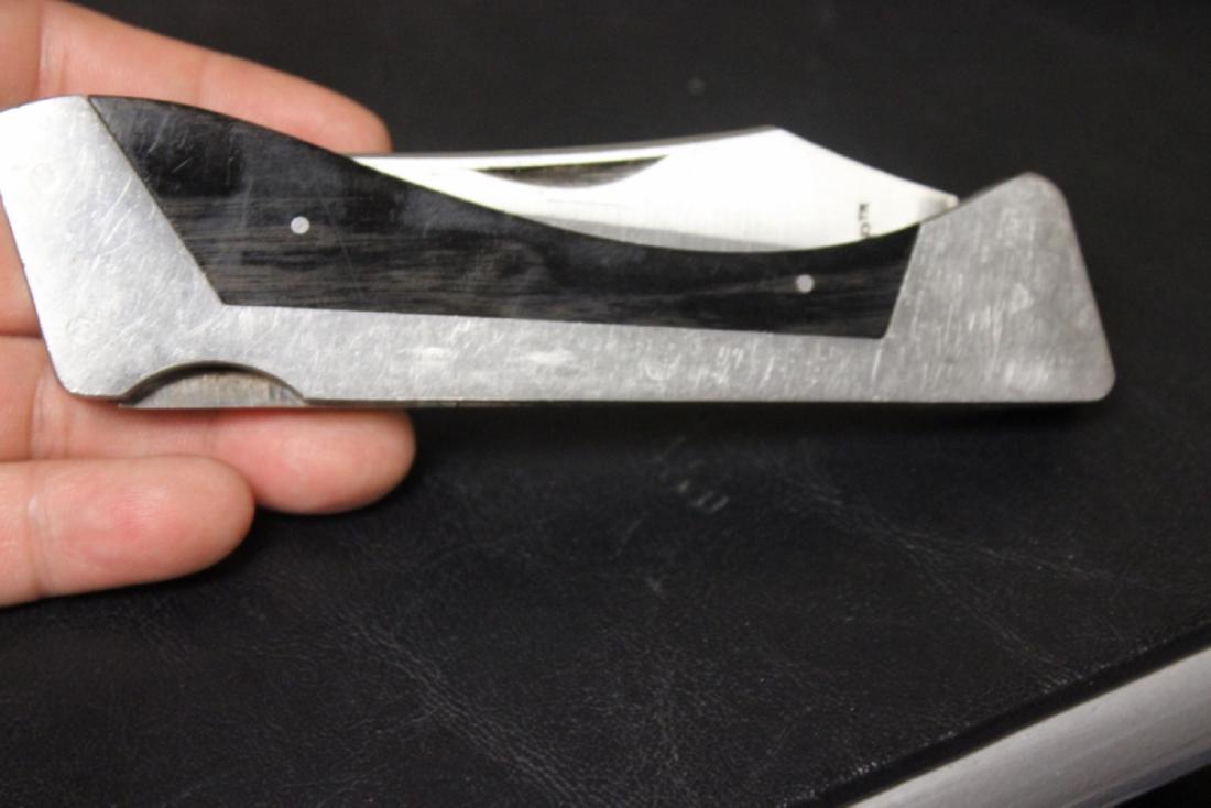 A Sharp Pocket Knife: as shown