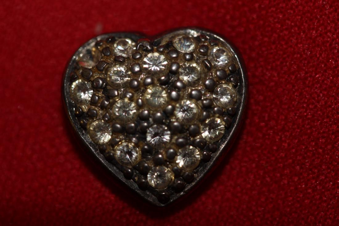 A Sterling Heart Pendant: as shown