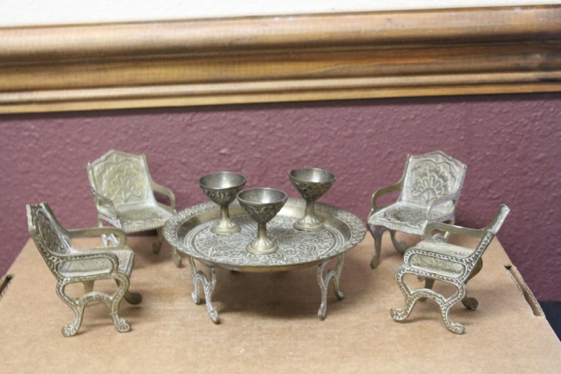 A Miniature Brass Table with Chairs and Cups: Diameter of table= 4 3/4"