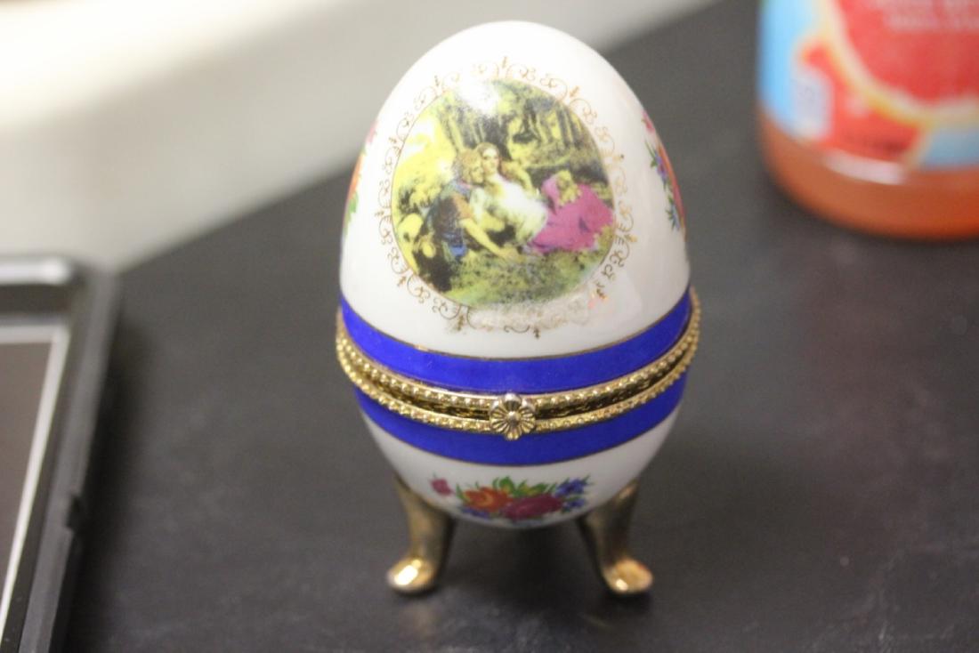 A Limoge' Egg Trinket Box: 4 inches tall