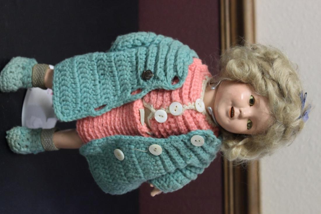 A Vintage 1930's Shirley Temple Ceramic Doll with Song: Doll stand not included - 13 inches tall
