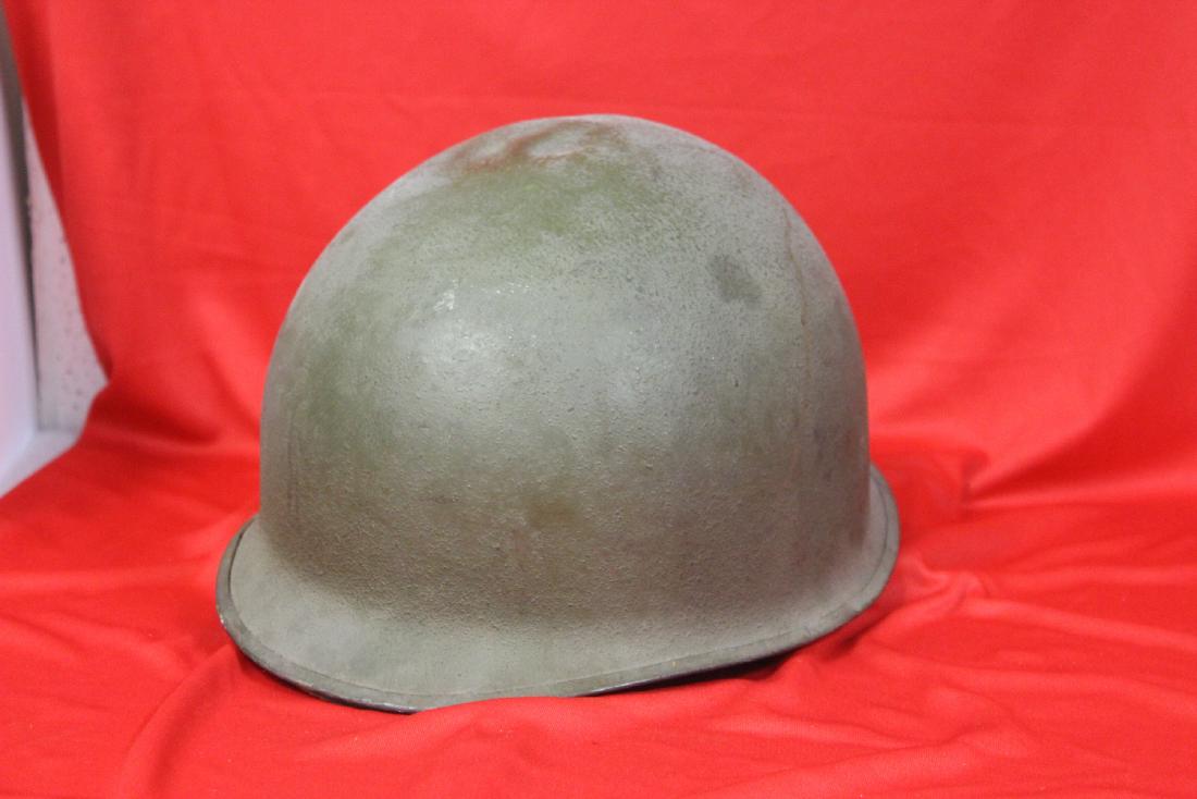 A Helmet: Either WWII or Korean or Vietnam - with liner