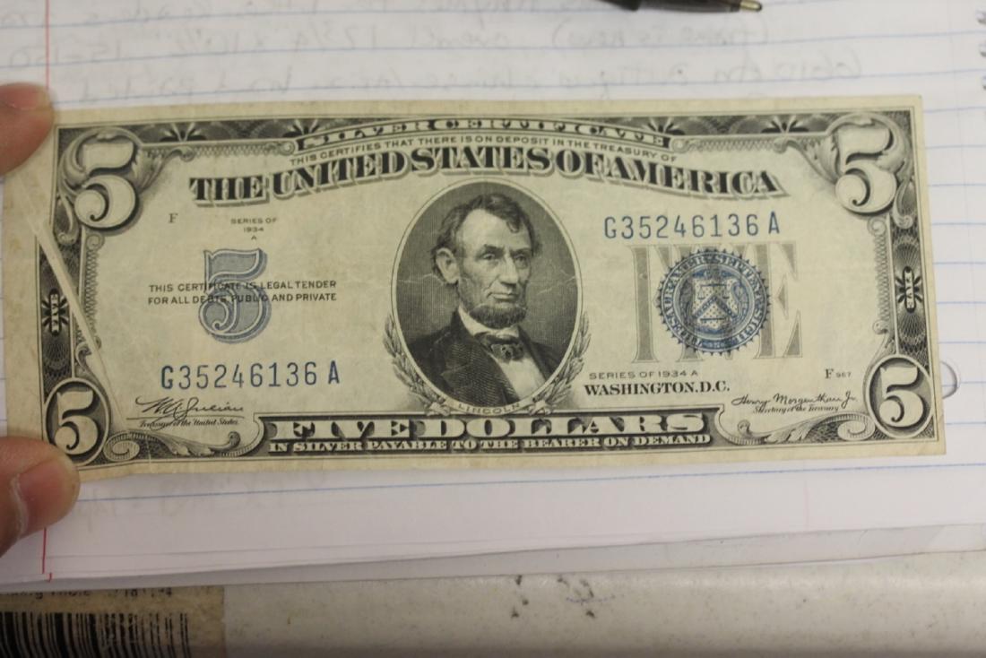 An Error $5.00 Note - 1934: Folding error and misaligned - very rare