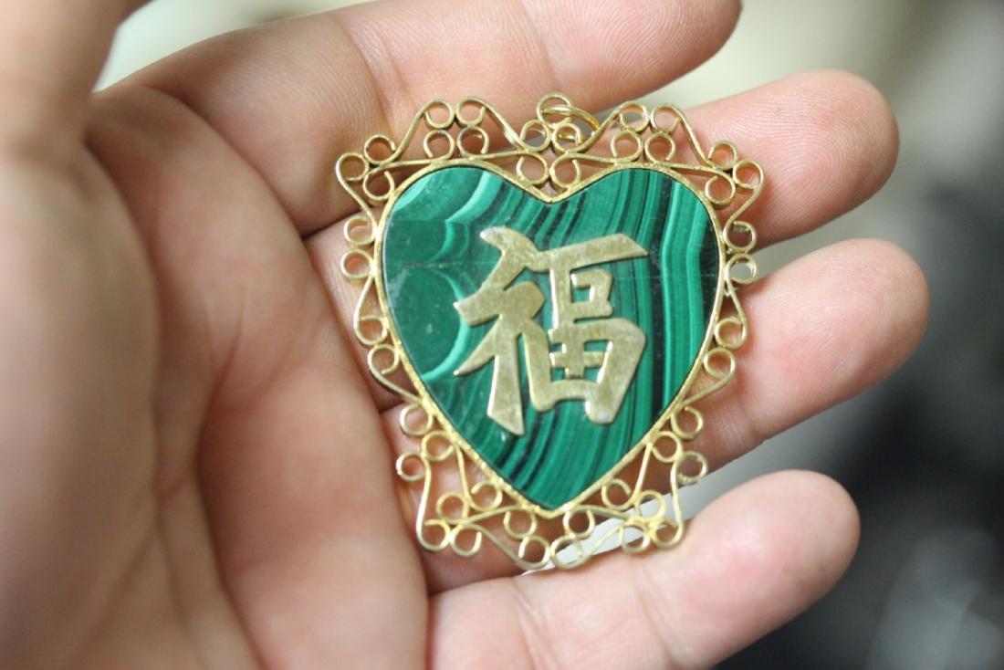 A Malachite and Gold Plated Chinese Character Pendant: as shown