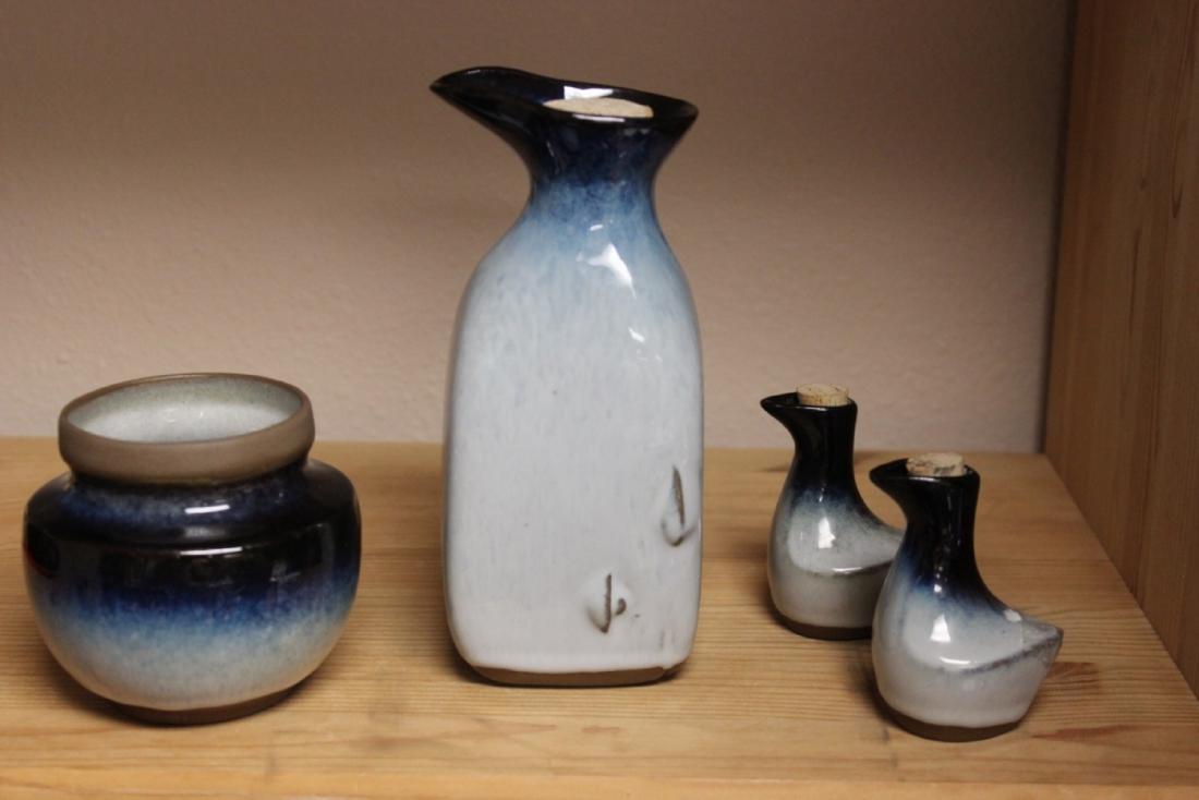 A Lot of 4 Peter Pots Modern Style Pottery: Including - Bottle, Jar, Salt and Pepper Shakers - All signed - Bottle 7 inches tall with cork