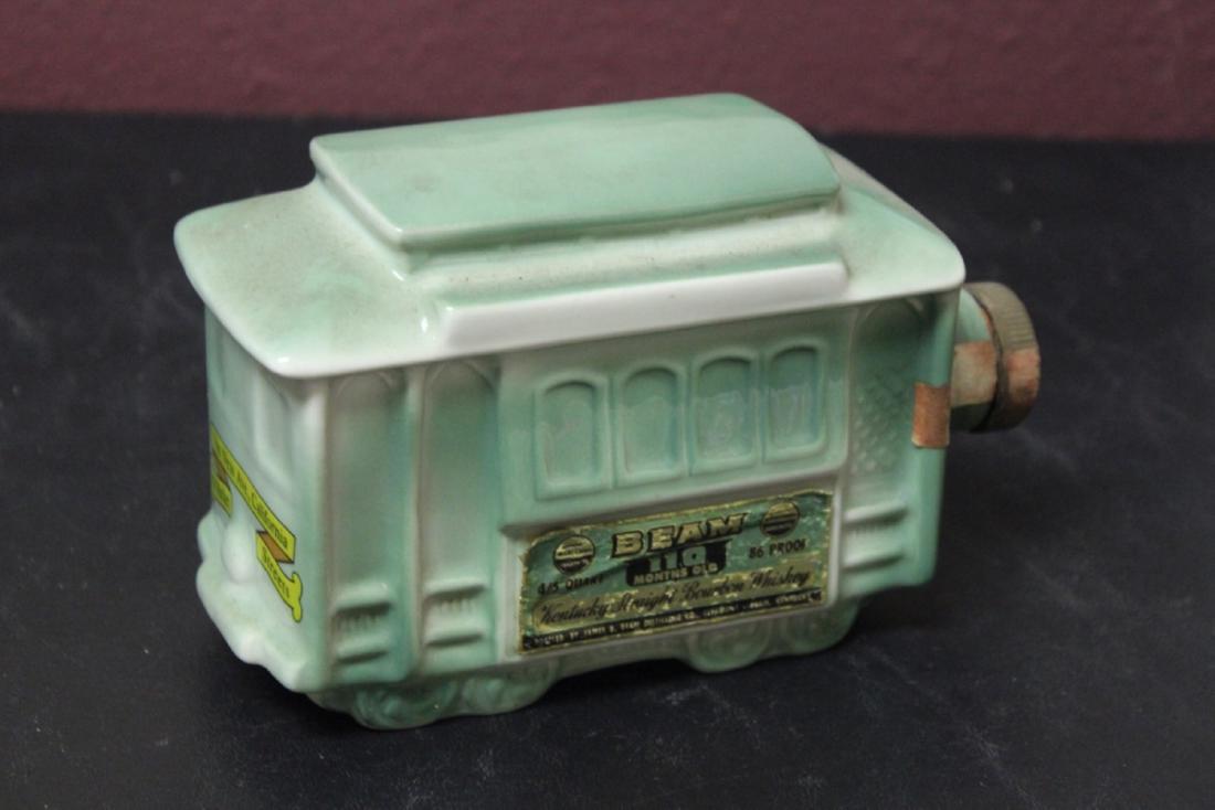 A Vintage Jim Beam Bottle: No spirit inside - 7 1/2" long