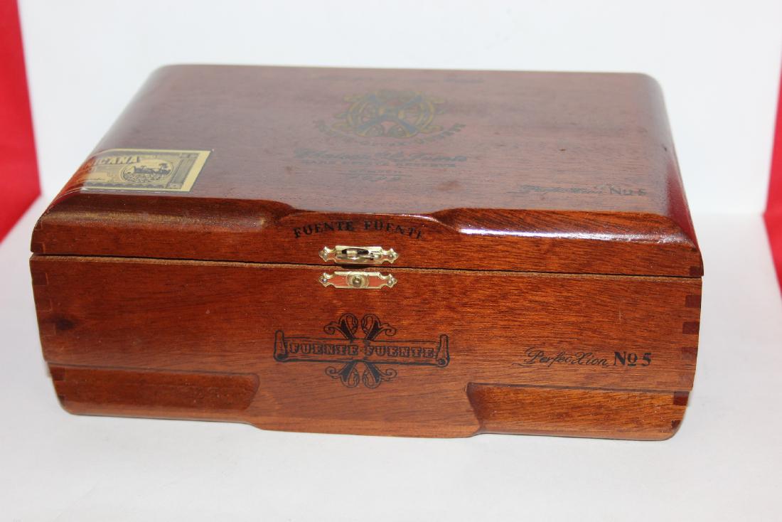 A Wooden Cigar Box: 8 1/4" x 5 1/4" x 3 1/2"