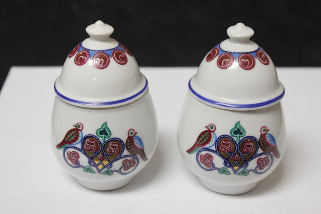 A Pair of Elizabeth Arden Scented Candle Holders: 4" tall
