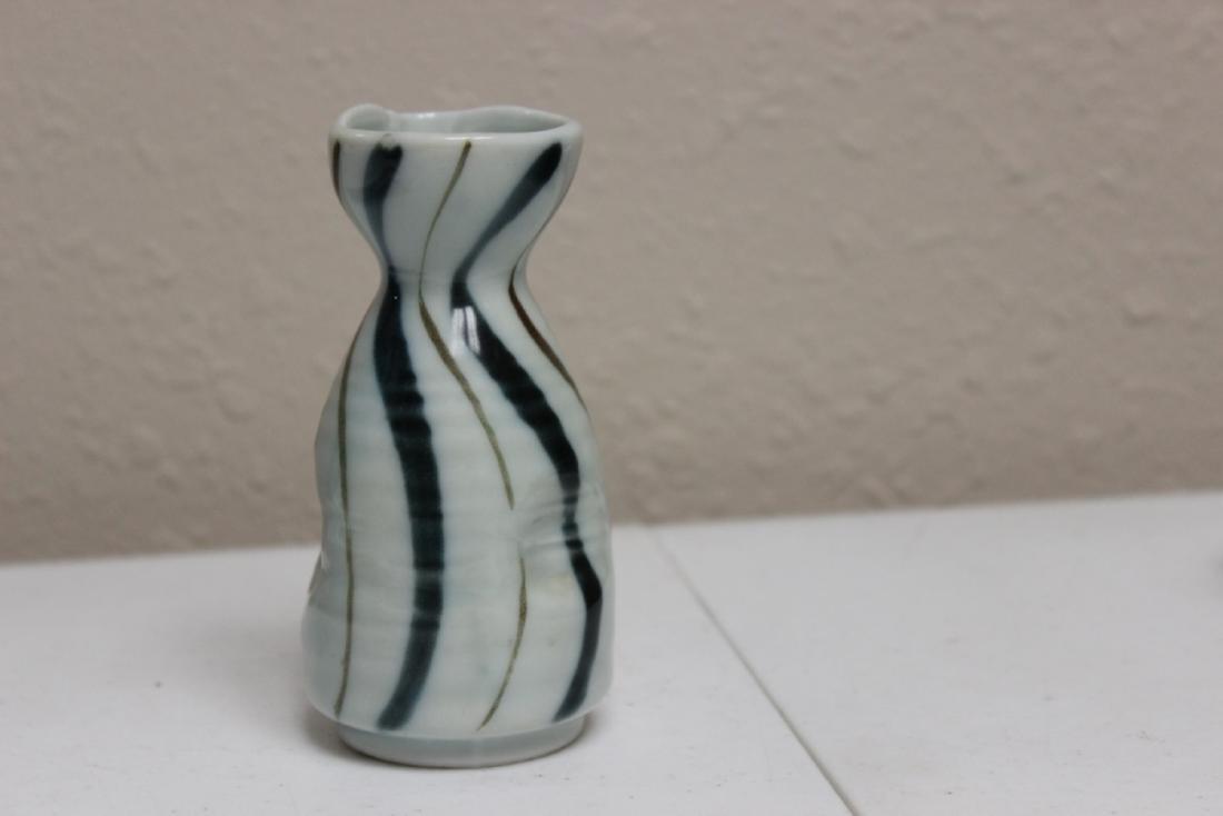 A Vintage Japanese Saki Bottle: 5 inches tall
