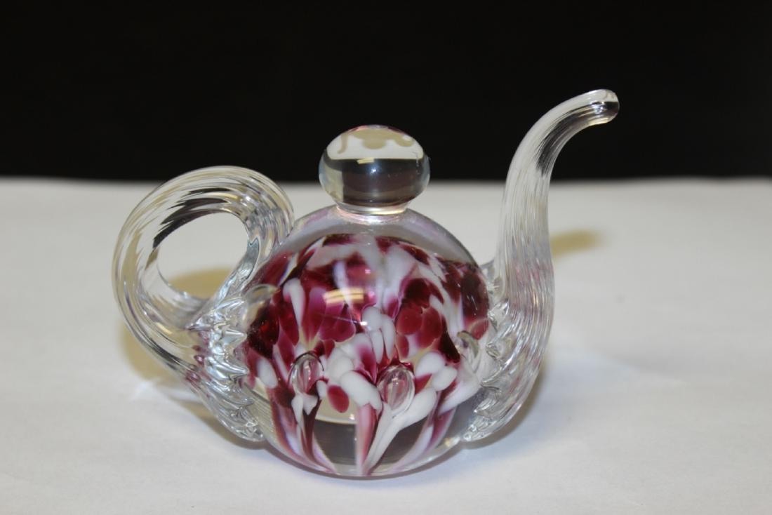 A Gibson Paperweight: 4 inches wide