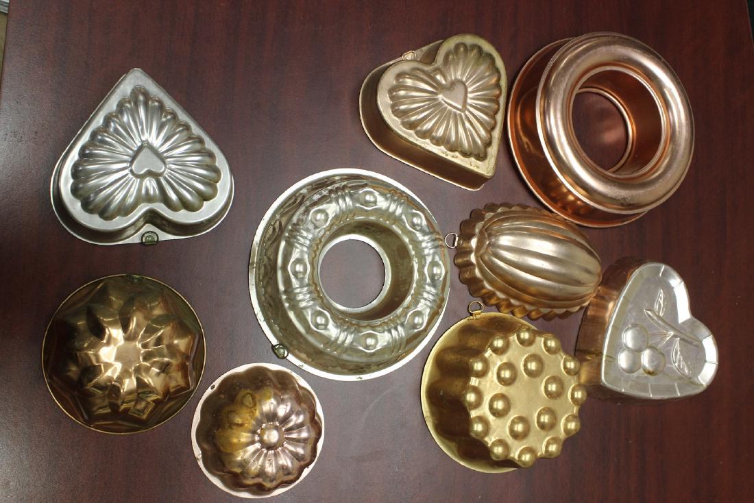 Lot of 9 Molds: different shapes and sizes - largest diameter= 9 inches