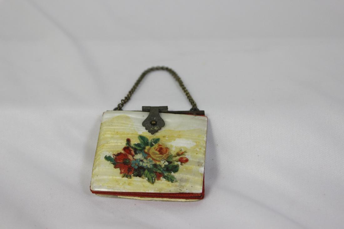 A Mother of Pearl Compact: 2" wide