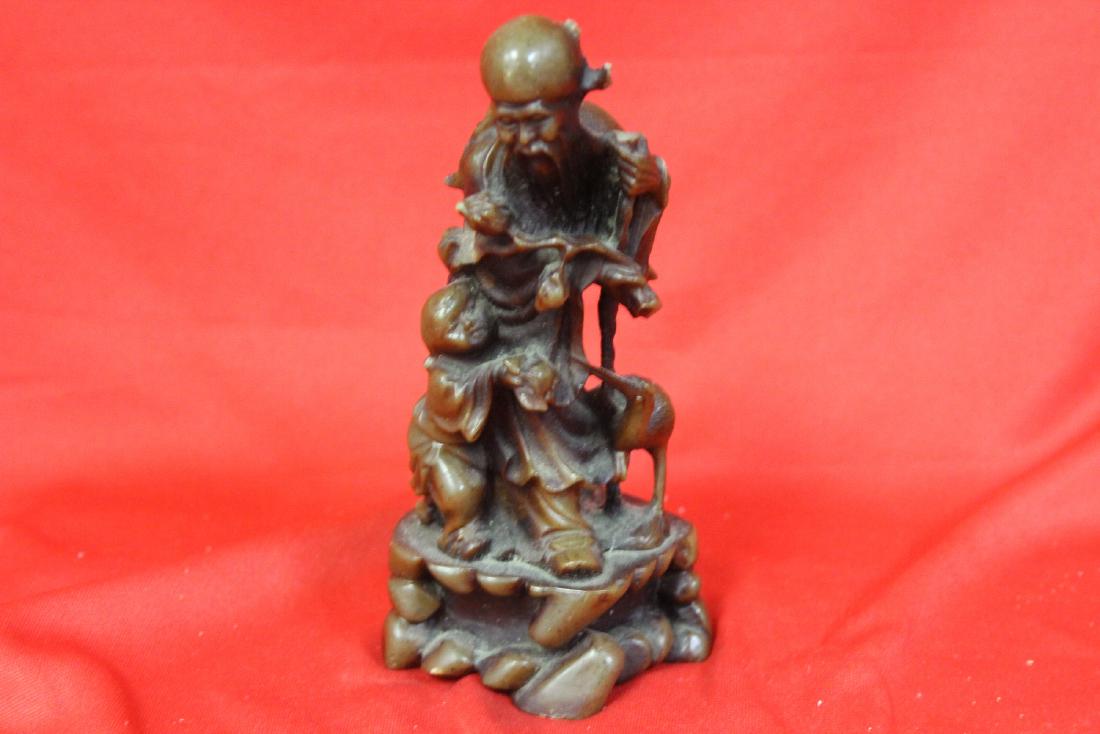 A Soapstone Sage: nicely carved - unfortunately something broke off on the side - 5 1/2" tall