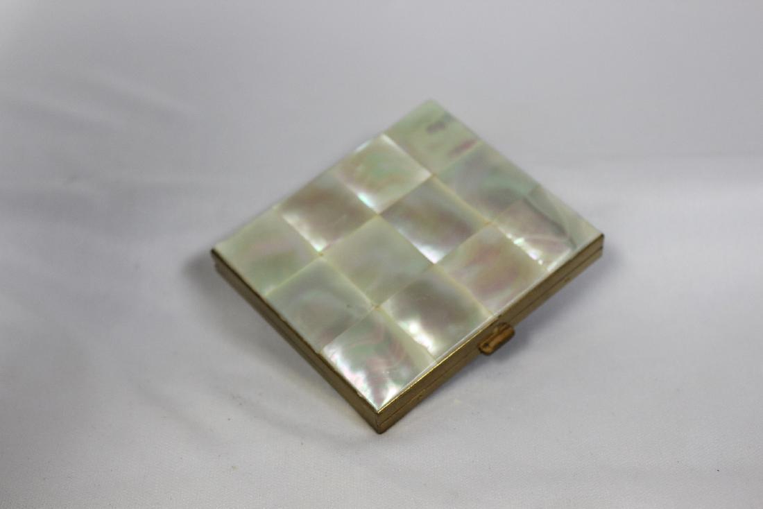 A Mother of Pearl Compact by Schildkraut: 2 3/8" x 2 5/8"