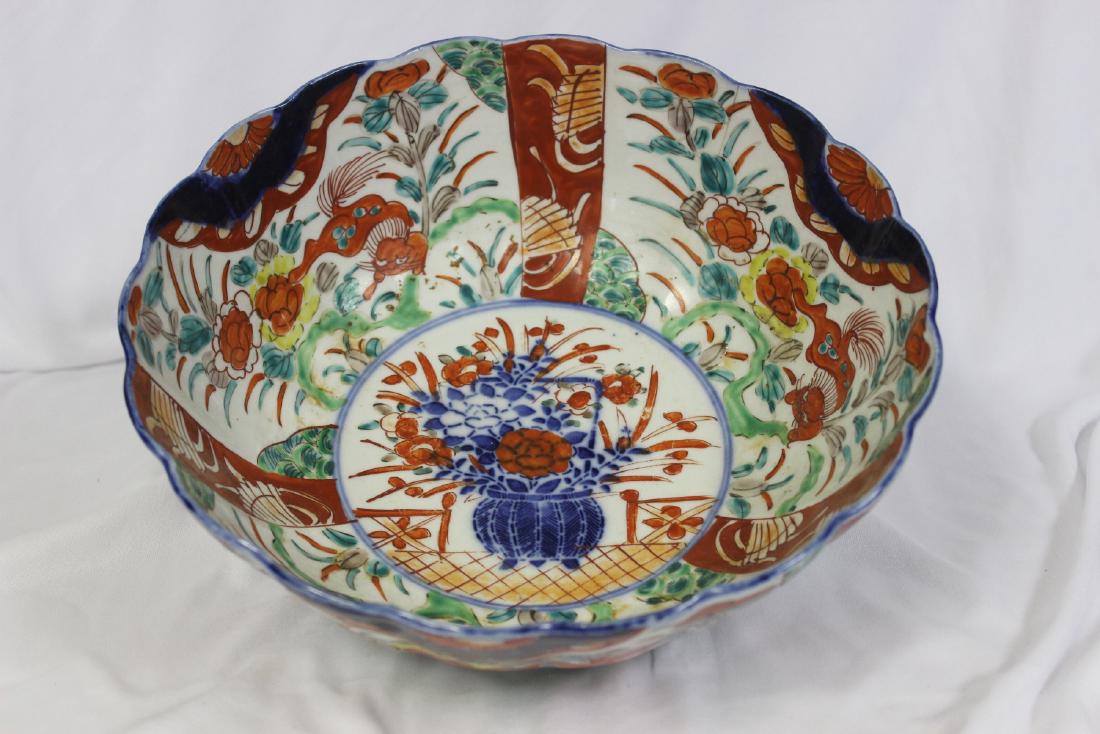 A Very Decorative Japanese Imari Bowl: Meiji Period - 19th century - please note: hairline - 10 3/4" in diameter