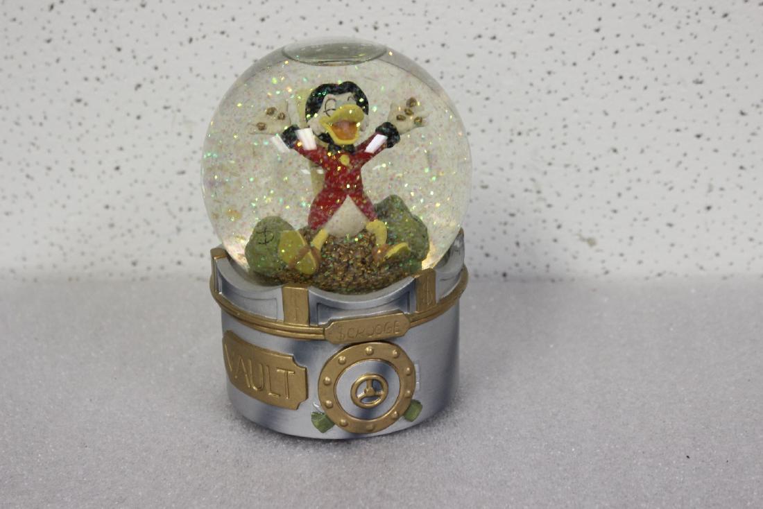 An Uncle Scrooge McDuck Musical Globe: 5 3/4" tall - works