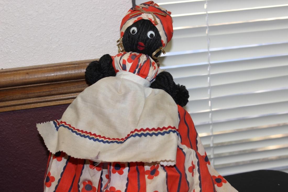A Vintage Black Fabric Doll: approximately 13 1/2" tall