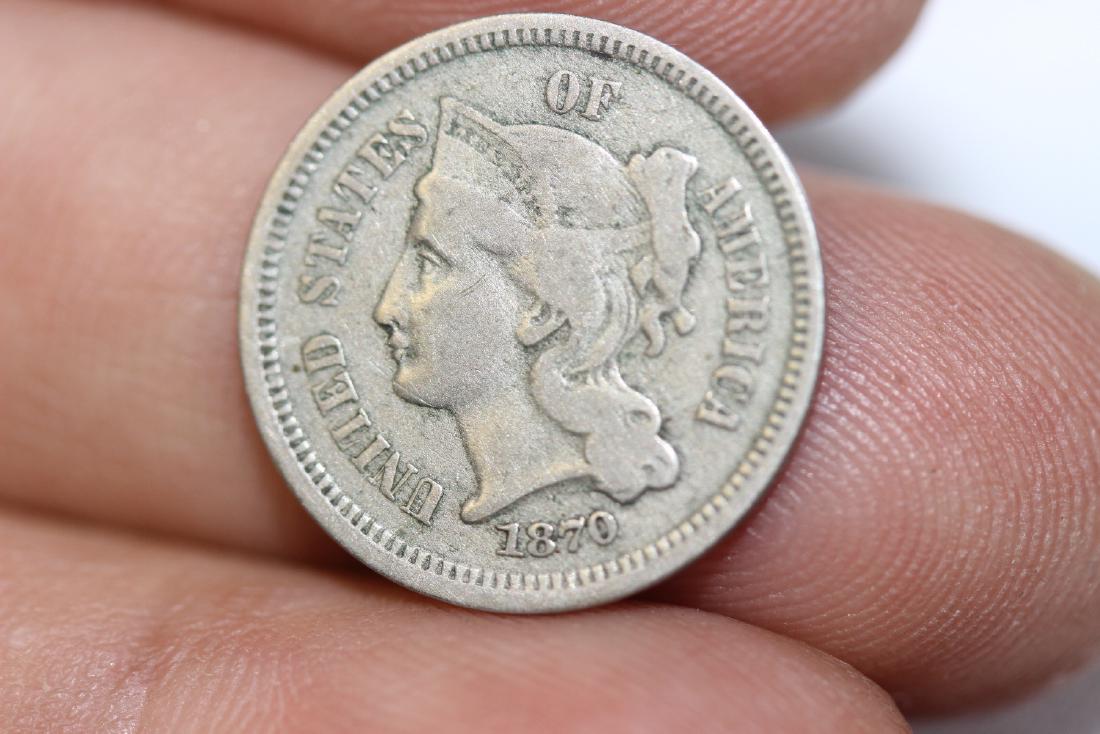 An 1870 US 3 Cent Piece: as shown