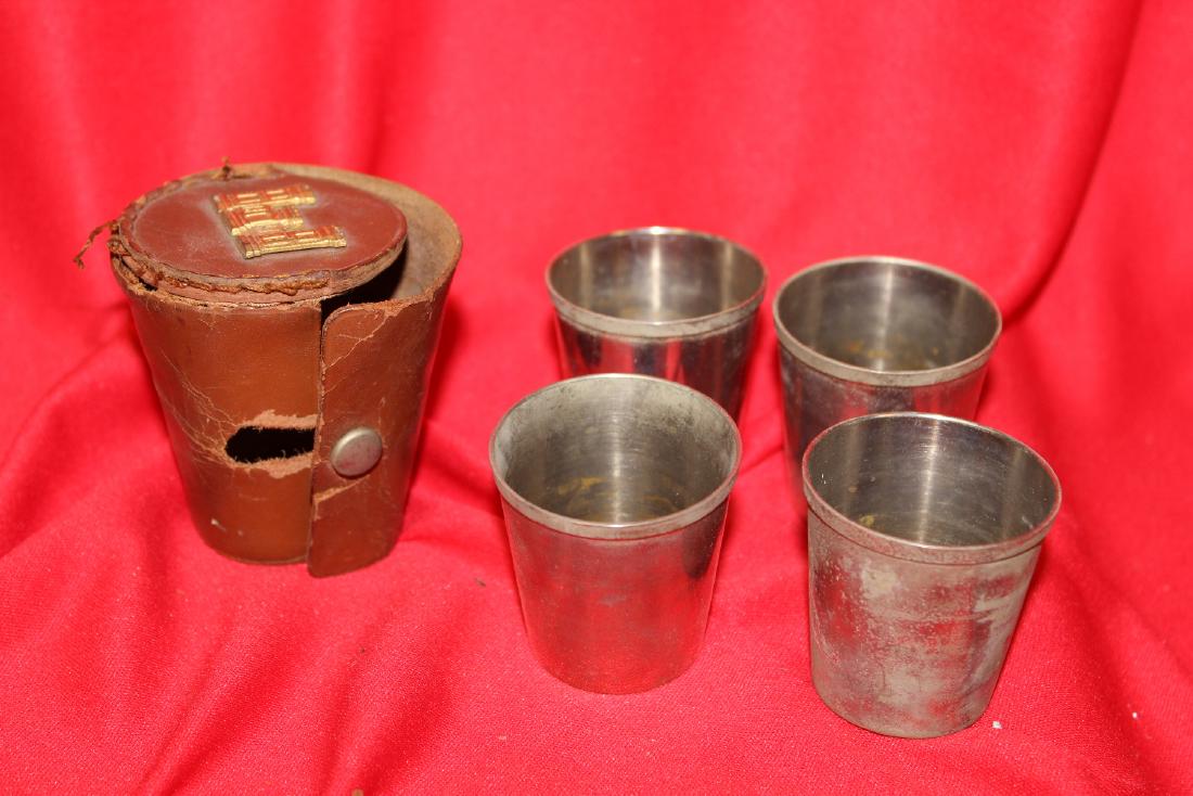 Lot of 4 Silverplated Shot Glasses: with leather holder - holder is torn as shown