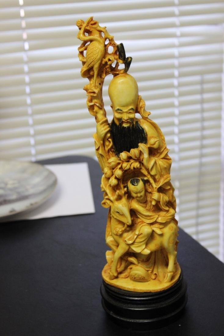 A Resin Chinese Old Man with Child and Bird: Good detail - 13 inches tall - please note missing pinky finger