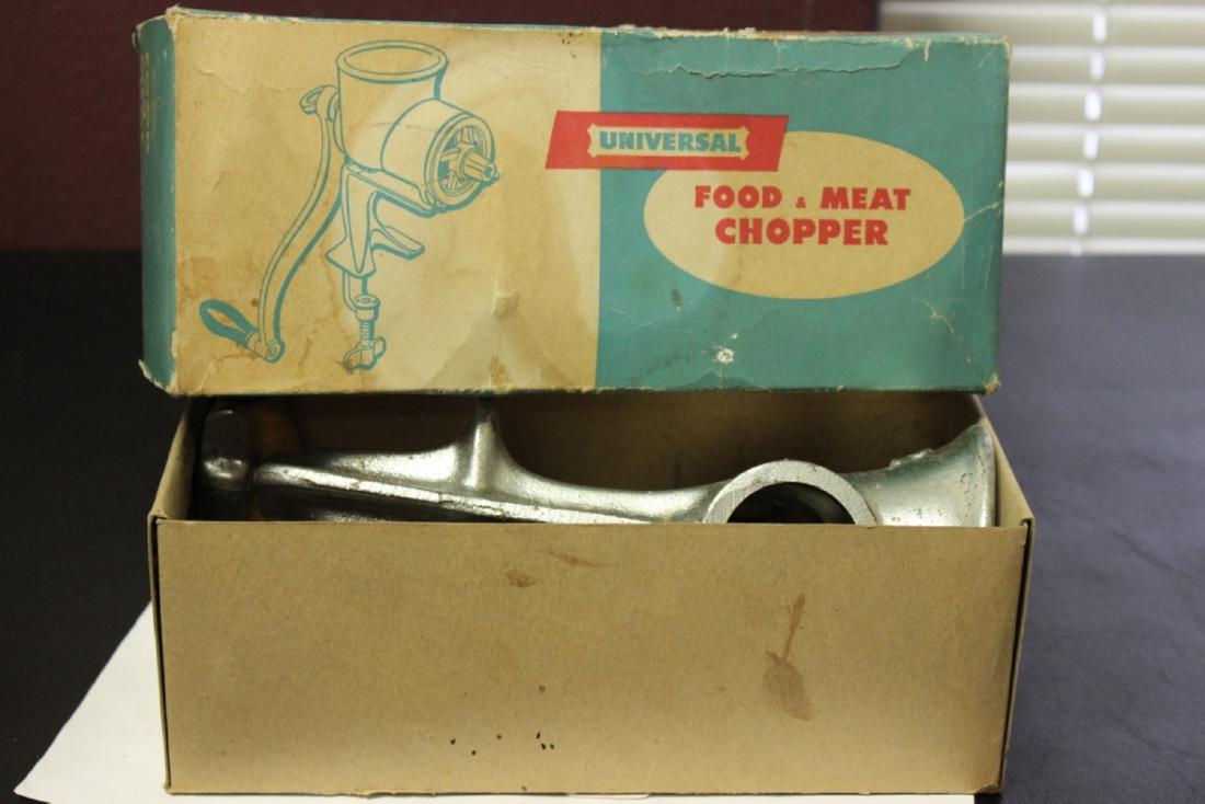 A Vintage Universal Foods Meat Chopper in Box: Do not know if all components are there or not